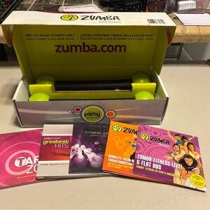 Zumba Fitness Kit with DVDs and Toning Sticks. Only used a few times